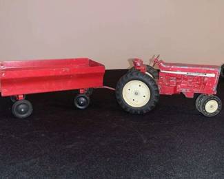Vintage 18 Inch International Toy Tractor and ERTL Cart