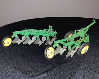 Three John Deere Plows Approximately 7 Inches