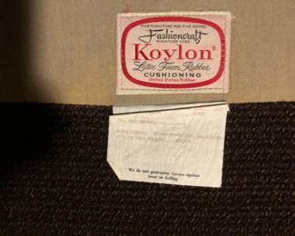 Fashioncraft Koylon tag on brown sofa.