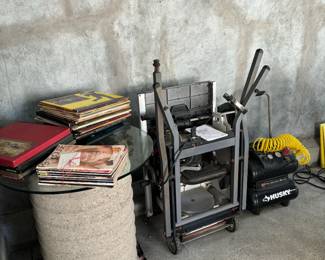 Vinyl recordings portable table saw and compressor