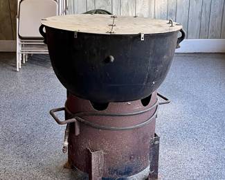 Cast Iron Cauldron Cooking Pot with Lid on Burner
