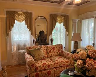 InFormal Sitting Room w/Loveseat, Large Round Coffee Table, Mirror & Heavy Indian Art  on Marble Top Stand, Lamp in Corner on Teak Asian Design Stand
