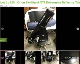 Lot # : 200 - Orion SkyQuest XT8 Dobsonian Reflector Telescope
has stand that swivels, storage case and measures 45" long.