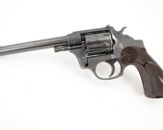 Make: J.C. Higgins
Model: 88
Caliber: .22 Cal
Action: DA
Barrel: 6
Bore: Shiny
Serial # 583880
Condition: Very Good
This J.C. Higgins Model 88 was manufactured between 1959-65. This revolver features Checkered synthetic grips, a 6in barrel and is chambered in .22cal. The Model 88 sold by Sears & Roebuck, was manufactured by High Standard Firearms. This revolver remains in very good condition, showing normal signs of use and wear.