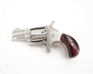Make: North American Arms
Caliber: .22 Short
Action: SA
Barrel: 1
Bore: Shiny
Serial # S1288
Condition: Very Good
This single-action revolver is constructed entirely of stainless steel with a polished cylinder, polished flats and satin finish on the curves. Chambered in .22 short this pocket sized revolver is in excellent condition, showing normal signs of use and wear.