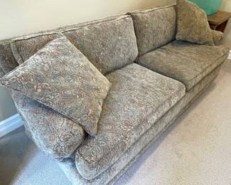 Gray Couch with Floral Pattern Upholstery