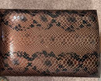 Snake skin cover on wooden footstool available for presale!

For pricing on presale items, call or text (931) 996-2642 