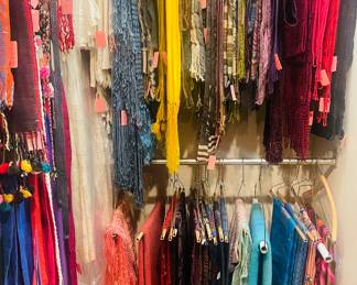 Many hand woven belts, scarves, & wraps