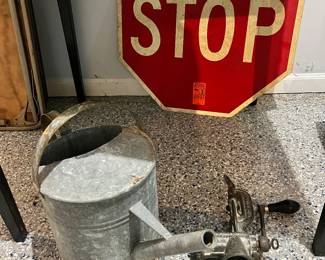 Old Metal Stop Sign and Vintage Galvanized Watering Can  