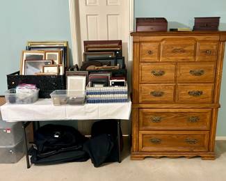 Large selection of frames and very nice tall chest of drawers