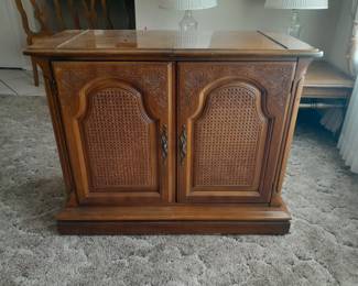 Vintage Buffet-38x30, charming cabinet features detailed wood and caning accents, with storage for entertaining essentials.