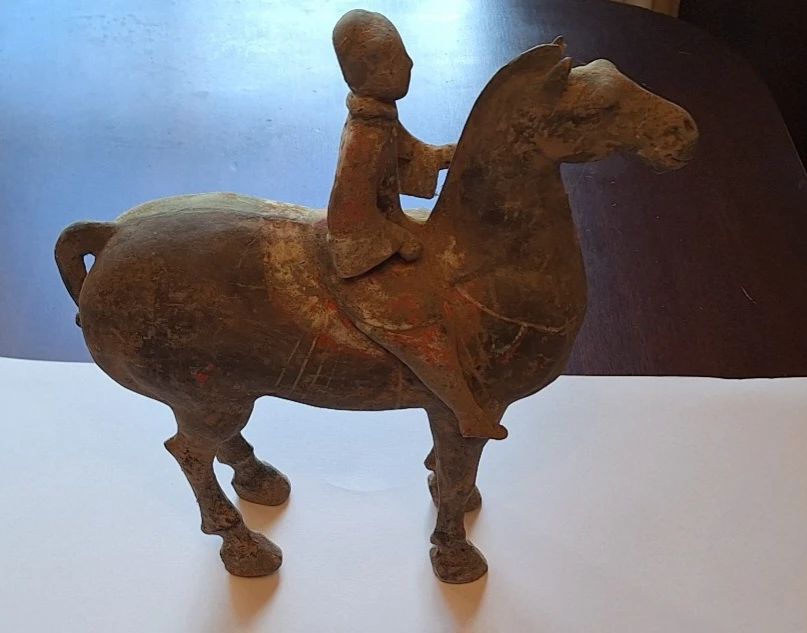 Han Dynasty terracotta equestrian soldier circa 206Bc-220AD. Each statue has documentation and brief history. Measures 11 1/2 " tall and 11" long.