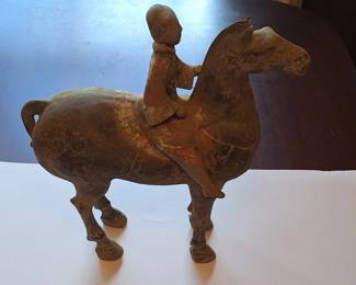 Han Dynasty terracotta equestrian soldier circa 206Bc-220AD. Each statue has documentation and brief history. Measures 11 1/2 " tall and 11" long.