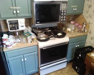 Vintage beer glasses, sherbet glasses, restaurant ware cups, canister set, cast iron, and much more.