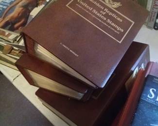 State stamp replicas, 2 full books and one half. Great find for the stamps collector.