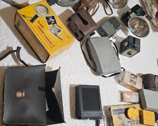All kinds of cameras, flashes, reels, lenses, etc.