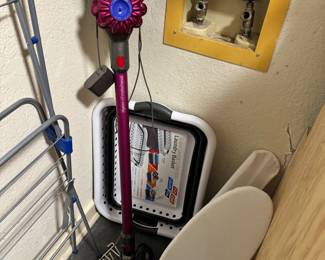 Dyson stick vacuum, laundry supplies