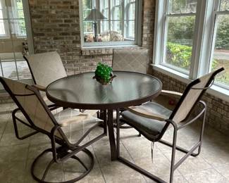 Round table with 2 swivel/rockers and 2 stationary chairs 