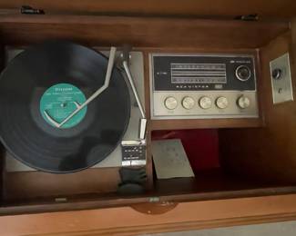 RCA Victor console stereo, AM/FM turner, record player, record storage