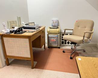 Oak desk, vintage office chair, vintage adding machines, vintage shredder and more.