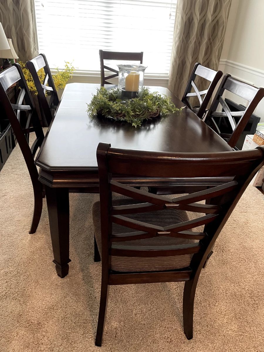 Dining table (has 1 leaf not currently in the table) . Six chairs
