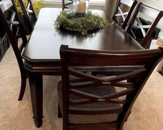 Dining table (has 1 leaf not currently in the table) . Six chairs