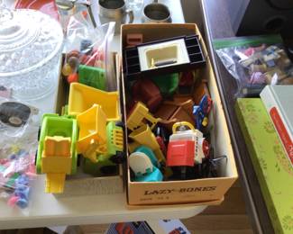 Vintage dollhouse furniture and Fisher Price little people and trucks