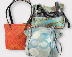 COACH Canvas/Silver Leather Handbag. SERPUI MARIE Leather and Printed Satin Handbag. AKO FRANCE Orange Sunflower Tapestry Shoulderebag with Rubber Reinforced, Genuine Leather Straps.