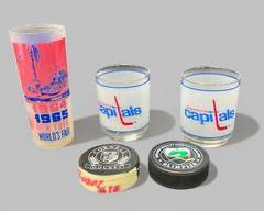 Hockey Collectors Lot Including Two Tumblers, Two Pucks and a 1964-5 New York Worlds Fair Glass Washington Capitals