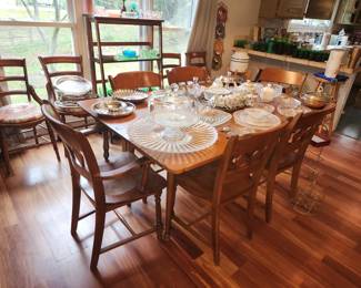 Dining table with side dropping panels, includes 6 chairs