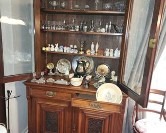 China cabinet with salt and pepper collection