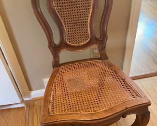 Cane seat and back carved side chair