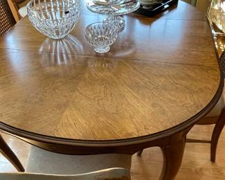 Dining table with additional leaves - curved legs - excellent condition and 4 side chairs with cane backs