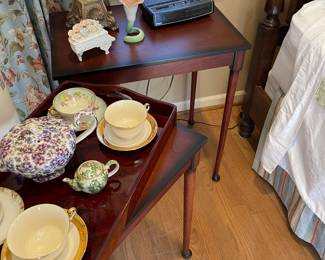 Small side tables, tea pot and cups and saucers on Asian tray