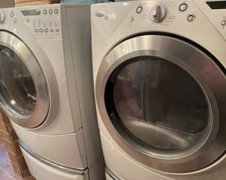 Whirlpool Duet front loader with riser washer and dryer