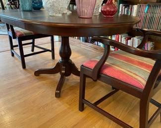 Another view of the single pedestal dining table with 2 chairs