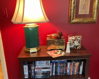Bookcase (2 shelves), brass and porcelain lamp, brass storage box, duck, matches and Asian prints - framed
