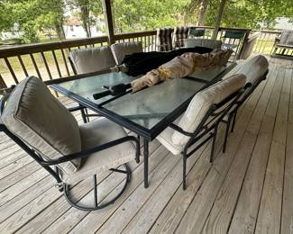 Nice glass top patio table, six upholstered chairs & umbrella