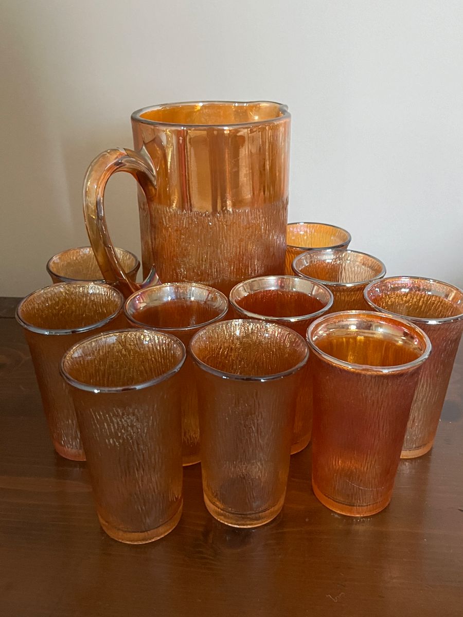 jeannette marigold carnival glass tree bark pitcher and glasses
