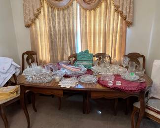 assorted glassware on  bassett dining table