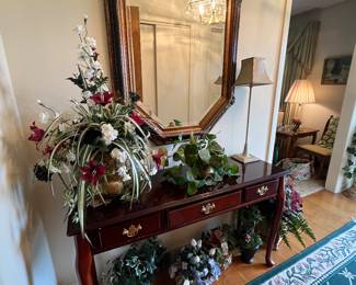 foyer table with wall mirror and assorted silks