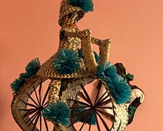woven straw bicycle girl