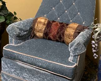 blue tufted swivel chair
