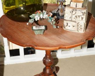 Scalloped edge pedestal table