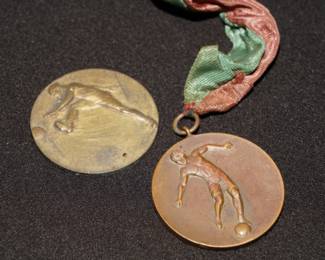Shot put medals x 2