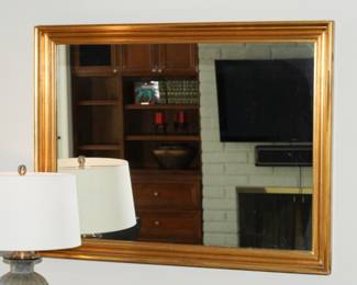 Gold framed wall mirror