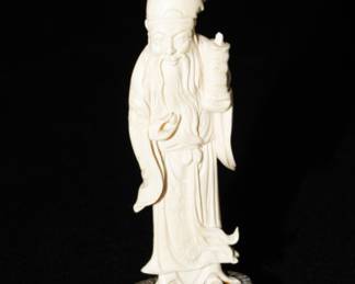 Carved Asian figure