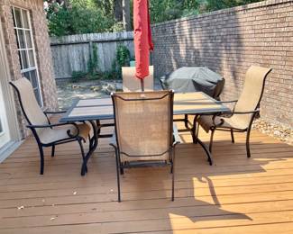 Nice outdoor table with 4 chairs umbrella and stand