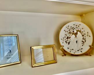 Many brass and gold frames