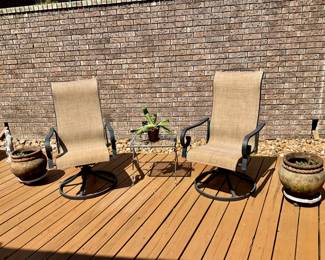 2 sets of swivel outdoor chairs